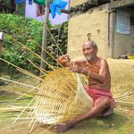 An old man hand-weaving a 'Doko', a basket made of bamboo strips.<br><br><small>Sinduli, Nepal | 2023 March</small>